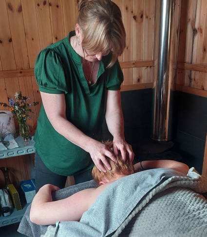 Photograph of Natasha giving a head massage